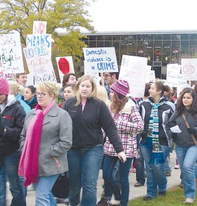 <span class='credit'>Photo By: Kristyn Sonnenberg | Photo Editor</span><span class='description'>On Monday, the annual Take Back the Night march took place to raise awareness for domestic violence and sexual assault. Participants met in the quad, marched down State street. then met at the dome room for a rally.</span>