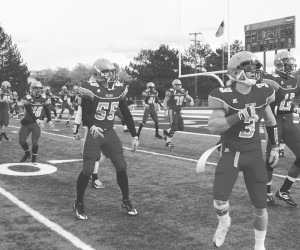 <span class='credit'>Photo By: Kate Dupon | Photographer</span><span class='description'>Amping Up: The team warms up before the second half of the homecoming game this Saturday against Indianapolis. </span>