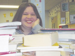 Feeling the pressure as the month winds down, Nicole Raymond has to write the second half of her novel before the National Novel Writing Month deadline Nov. 30. Photo By: Kelsey A. Schnell | Editor in Chief