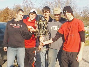 Club Disc Golf: The club disc golf team of Daryl Johnson, Justin Maluchnik, Alex Franko, Josh Pickard, and Brennan Billow hold their Michigan Intercollegiate Disc Golf Challenge Series trophy. The team defeated Western Michigan 70-49 at MIDGC #3 this Sunday. Photo Courtesy of Dr. Leonard Johnson