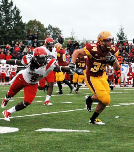 On a Roll: The Ferris State football team defeated Ohio Dominican on Saturday, Sept. 18 by a score of 34-28. Sophomore running back Skyler Stoker evades a Cardinal defender during the Bulldogs’ victory over Saginaw Valley State last week. Torch File Photo