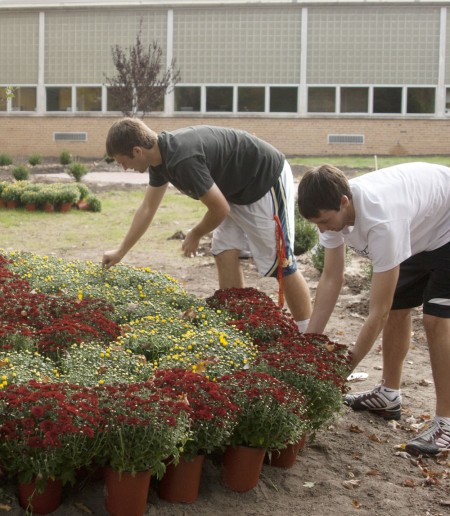 Planting for Helen : Ferris students are planting a garden in order to honor Helen Gillespie Ferris. The garden is located between the Alumni Building and the Prakken Building. Photo By: Kate Dupon | Photo Editor