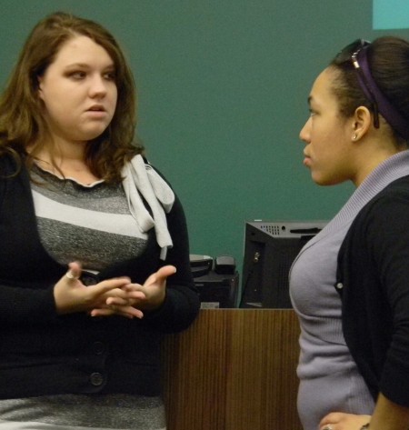 Student Discussions: Morgan Toms and Danielle Hoskey discuss controversial topics at the event “Free Speech, When It Goes Too Far.” Discussion topics were about anything from offensive imagery and bullying to the recent FSU T-shirts. Photo By: Angie Walukonis | Photographer