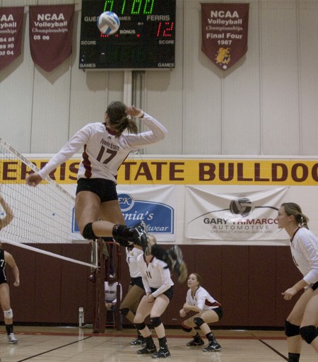 Winning Streak: Sophomore Aly Brecht spikes the ball in a victory over the weekend. The Bulldogs are on a three-game winning streak and their record improved 14-9 overall for the 2010 season. Photo By: Kate Dupon | Photo Editor