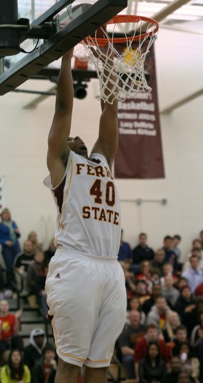 Heading to the Finals: Senior Justin Keenan jumps for a basket during the Feb. 26 game against Grand Valley. The Bulldogs took on Bellarmine on March 15 in the NCAA-II Tournament. Photo By: Brock Copus | Photographer