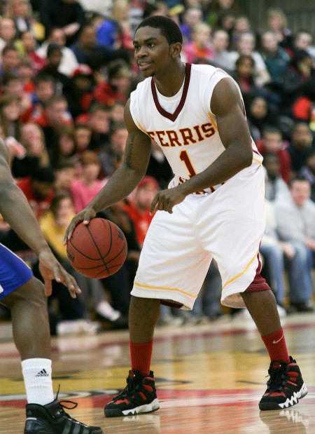 Looking Ahead: Junior Dontae Molden looks to move past a Grand Valley defender during the Feb. 26 game. The Bulldogs fell to the Lakers 82-80 in overtime. Photo By: Brock Copus | Photographer