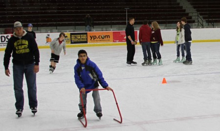 Hitting the Ice: Ferris students and Big Rapids community members enjoy open ice, above. The Big Rapids Figure Skating Academy, below, practices for the 34th annual ice show at Wink Arena on March 25 and 26. Photos By: Kate Dupon and Brock Copus