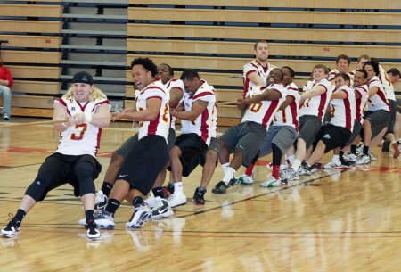 Tugging for Funds: Junior Mike Ryan and many of the Bulldog football players compete in a tug-a-war during the Lift-a-Thon on March 25. The Lift-a-Thon was held to raise funds for the football program. Photo By: Brock Copus | Photographer