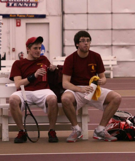 Championship Bound: Jack Swan, junior and Tyler Marengo, sophomore strategize during a match against Grand Valley. The Bulldogs will head to the GLIAC Championships in Midland on April 15. Photo By: Kate Dupon | Photo Editor