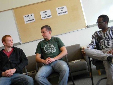 Africa to Ferris: Francois Vosloss, Christopher Vosloss and Lore Mmutle, left to right, are Ferris students who have lived in South Africa. During the Cultural Interaction event all three students shared stories about their experiences. Photo By: Angie Walukonis | Photographer