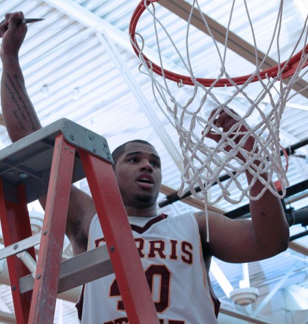 A Champion: Justin Keenan’s senior year has been full of recognition. Keenan was named Division II Bulletin National Player of the Year and he now holds school records in career points and made free throws. Torch File Photo