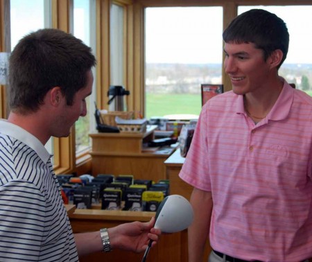 Summer Jobs: Ian Suszko and Logan May, left, discuss clubs in the Katke Pro Shop. Right, FSU student Ashley Schultz helps a customer at her job at B-Tan. There are many jobs available for students staying in Big Rapids over the Summer.  Photo By: Sam Lehnert | Ad Layout Assistant