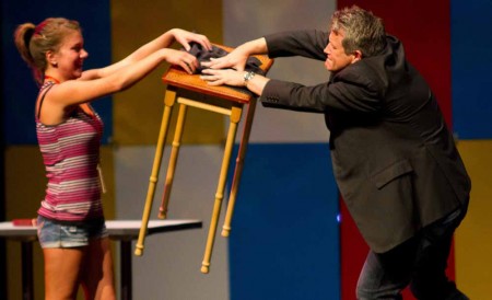 Mesmerizing Performance: Craig Karges, a mentalist, shows off his skills during a performance at Ferris State. Karges acts included levitating, moving objects, reading minds and writing without using his hands. Photos By: Brock Copus | Web Editor