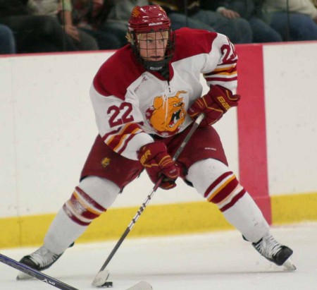 Bulldogs Beat Lakers : FSU senior denseman Derek Graham looks for a play opportunity during the Nov. 11 game against Lake Superior State, where the Bulldogs defeated the Lakers 5-1. Photo By: Brock Copus | Multimedia Editor