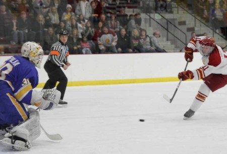 Split Series: FSU senior center Jordie Johnston takes a shot and scores against Lake Superior State on Nov. 11. The Bulldogs defeated the Lakers on Nov. 11 and tied on Nov. 12. The 2011-12 record is currently 9-2-1 overall. Photo By: Brock Copus | Multimedia Editor