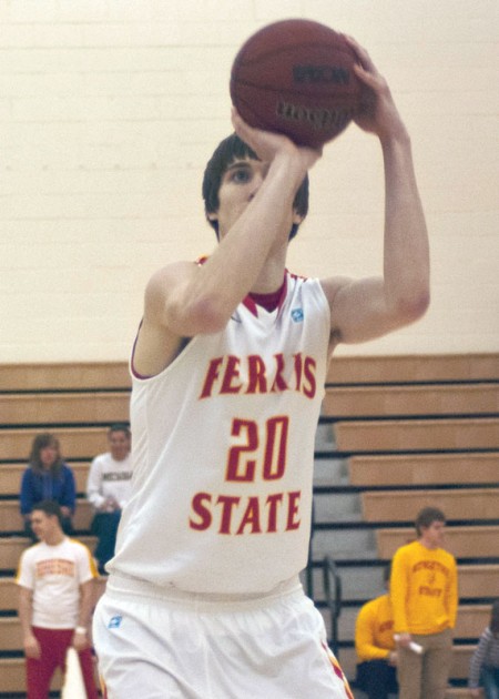 Under Pressure: Bulldog redshirt freshman center Jared Stolicker loads up a free throw against Northern Michigan. The men’s basketball team extended its home winning streak to four games. Photo By: Tori Thomas| Photographer