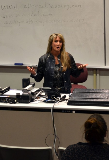 Rebecca Kiessling: Pro-life speaker Rebecca Kiessling speaks to an audience in the Business Building about her story of finding her birth mother and her advocation for the rights of the unborn. Photo By: Eric Trandel | Photographera