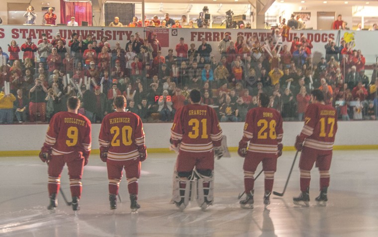 Senior Sendoff: Bulldog senior hockey play­ers were rec­og­nized at Saturday’s game against Bowling Green. From left to right, Bulldog cen­ter Travis Ouellette, cen­ter Matthew Kirzinger, goal­tender Rob Granett, left wing Kyle Bonis and right wing Eric Alexander. Photos By: Brock Copus | Multimedia Editor