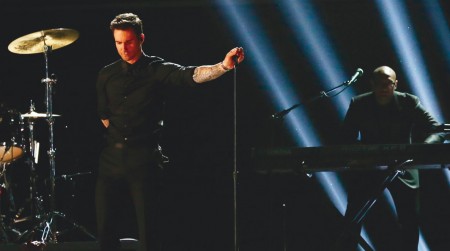 He Will Be Loved: Maroon 5 lead singer Adam Levine on stage for the Grammys 2013 with Alicia Keys. Although he suffered from laryngitis, his group still put on a show at Van Andel Arena in Grand Rapids. Photo Courtesy of MCT Campus