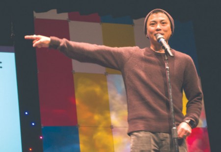 Spoken Word: Poet Asia Samson shares his art with a crowd in the Williams Auditorium. His spoken word poetry expresses his feelings and life experiences to the audience. Photo By: Eric Trandel | Photographer