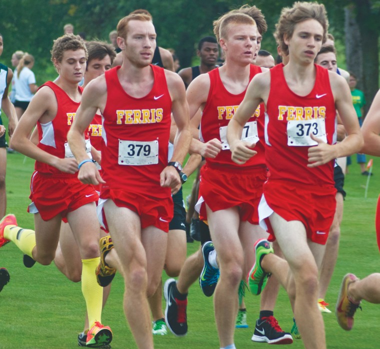 Setting the Pace: Members of the Ferris men’s cross country team fight for the lead at the Ray Helsing Bulldog Invitational on Saturday. The event was the team’s only home meet of the season. Photo By: Tori Thomas | Photographer 