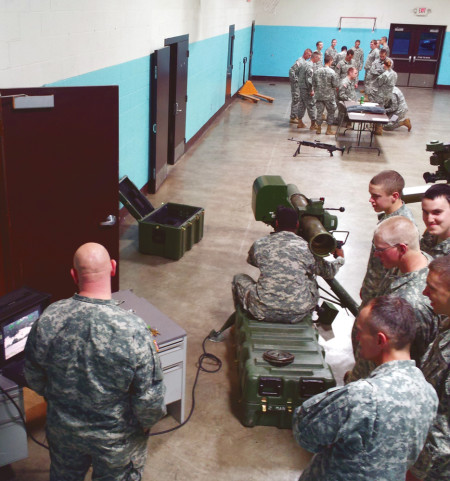 Members of the Ferris ROTC program meet for their yearly Cadets Weapons Lab. Here, students get a feel for a variety of weapons, including shotguns, machine guns, pistols and even heavy equipment such as the TOW (Tube-launched Optically-tracked, Wire command-link guided missile system), which is new to the lab this year.  Courtesy Photo Provided By: Georgia Thelen