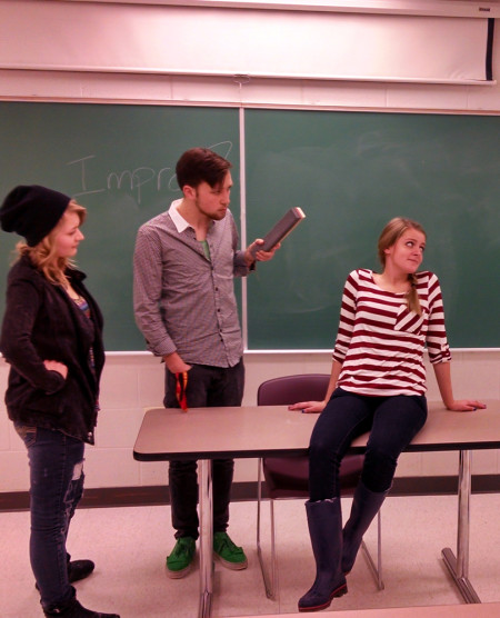 Devin Anderson (middle) and Jenna Matelske (right) host an evening of improv comedy as part of the group set up by theater fraternity Alpha Psi Omega. Improv’s comedy shows are open to all students every Sunday night at 7p.m. in Starr 138. Photo By: Tyler Hanan | Lifestyles Editor