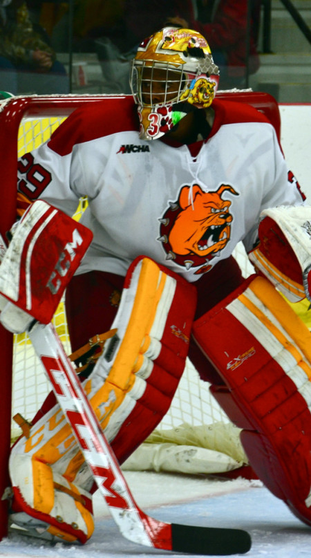 Sophomore goaltender Charles Williams warming up prior to the home opener, back on Oct. 18. Williams has seen limited action since, but may see extended minutes following his 25 save shutout at Michigan Tech on Jan. 25. Photo By: Harrison Watt | Sports Editor