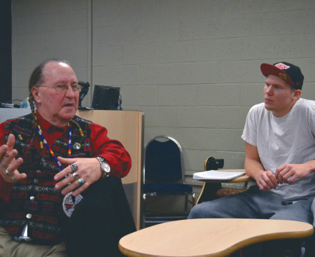 A Big Rapids community member shares his thoughts during the “Imaginary Indians” event on Feb. 25. The event analyzed derogatory artifacts and images of Native Americans created by popular white culture.  Photo By: Corey Saladin | Interim Photographer