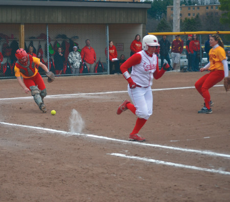 Ferris freshman catcher Casey Bias reaches to field a bunt against Saginaw Valley State in one of the few home games Ferris has been able to play this spring. Photo By: Corey Saladin | Interim Photographer