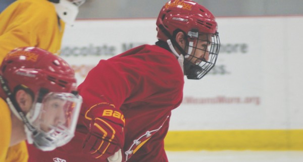 Senior defenseman Travis White skates ahead of the pack during a practice.