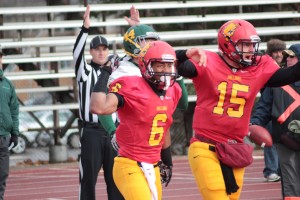 Jason Vander Laan and Shakur Sanders celebrate a touchdown.