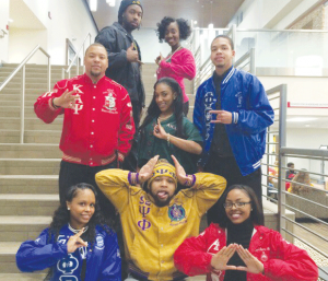 Members of the Black Greek Council, pose for a photo in the new University Center.