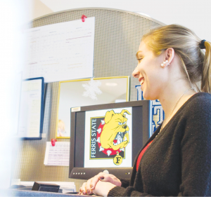 Haylie Lenon, a sophomore in Pre-Nursing, gets some information about Financial Aid at the Timme Center.