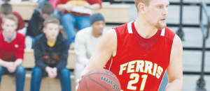 Bulldog #21, Drew Lehman tears up the court earlier this season against Tiffin. Lehman is the team leader in points, and recently scored his 1,000th career point as a Dawg.