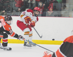 Senior forward Justin Buzzeo fires a shot at Bowling Green freshman goaltender Chris Nell during a 3-2 win over the then No. 8 team in the nation.