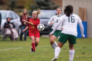 Defender Hunter Dolan fires a pass in traffic during the 2014 season.