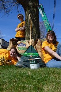 Ferris students Alison Jarabeck (left) and Allison Caister (right) take a break from yard work during the Big Event this past weekend, where Ferris students went into Big Rapids and the surrounding communities to lend a helping hand.