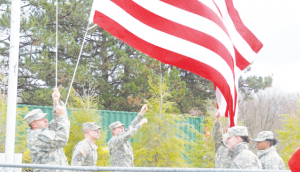 In this Torch File Photo, the Ferris ROTC students raise the flag at a football game.