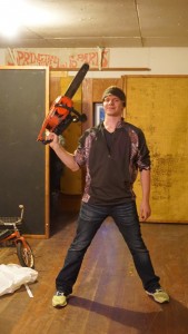 Caleb Schultz will rev up a chainsaw during Circle K International’s haunted house project next weekend and on Halloween.