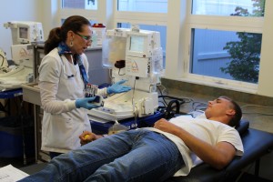 Casey Hanson opts to donate twice the amount of red blood cells using this machine, which collects double the red blood cells but returns most of the plasma to the donor.