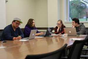 Members of the Advocacy and Education for Gender Identity and Sexuality organization plan for a future of Ferris inclusivity at a group meeting.