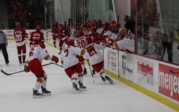 The Bulldogs celebrate after junior forward Gerald Mayhew scored his second goal of the game in the second period to give the Dawgs a momentary lead.