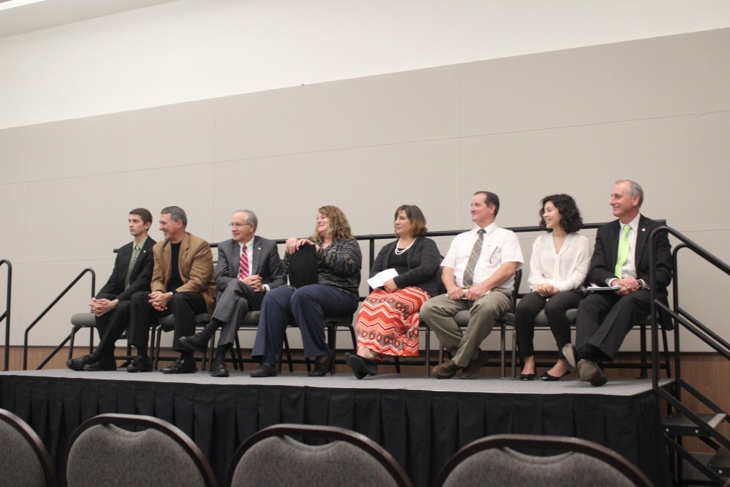 Wayne Bersano, Perk Weisenberger, David Eisler, Janine Ward-Roofe, Angela Roman, John Urbanick, Lola Schultz and Jerry Scoby field questions from students for “State of the University.”