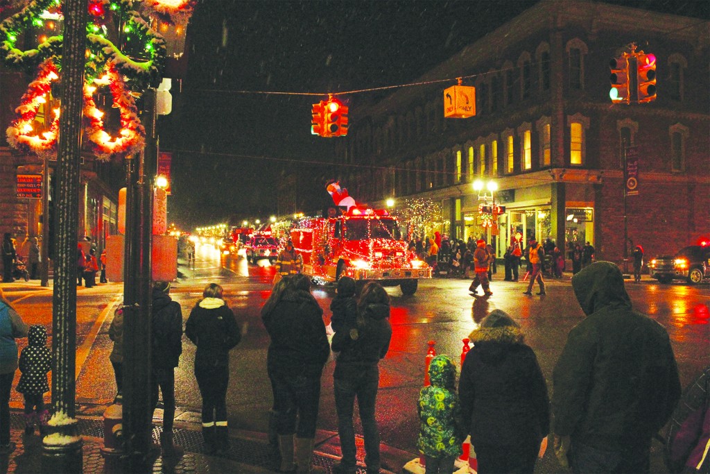 Michigan Avenue was busy with the sound of firetrucks and clacking of reindeer hooves for the annual Festival of Lights parade.