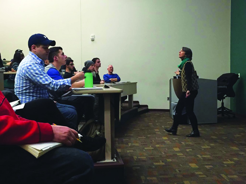 Dr. Hoban lectures to a full hall of people in the IRC about climate change. 