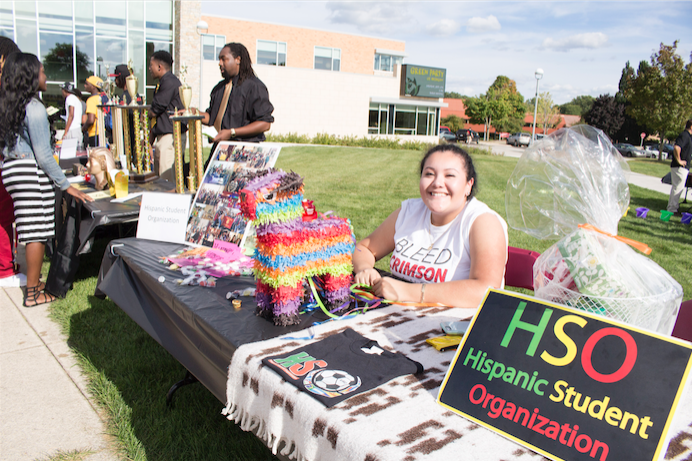 Ferris nursing and respiratory care therapy sophomore Diana Giles worked at the Hispanic Student Organization booth at the Office of Multicultural Student Services’ annual “Get Acquianted” event.