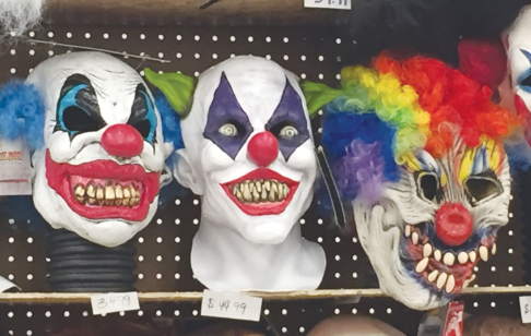 Clown masks on display in Big Rapids’ Halloween Store, located off of Perry Avenue.