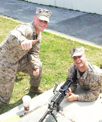 Joel Lloyd (right) and a fellow Marine during training. Lloyd is now a student in the welding engineering technology program.