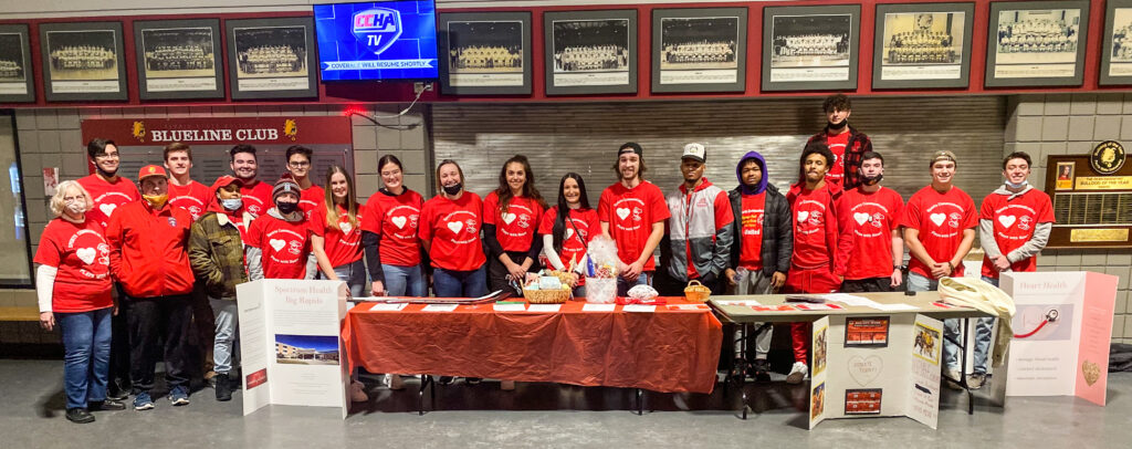 Red out volunteers stand for a group photo